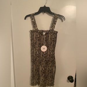 Snake skin patterned smoked mini dress.